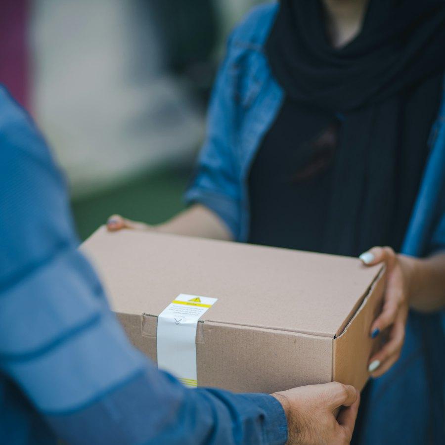 A driver handing over a delivery