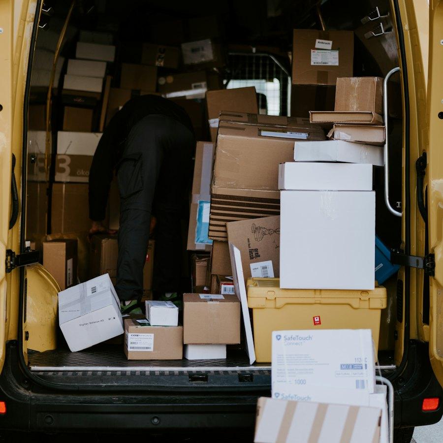 A delivery vehicle being loaded at the depot